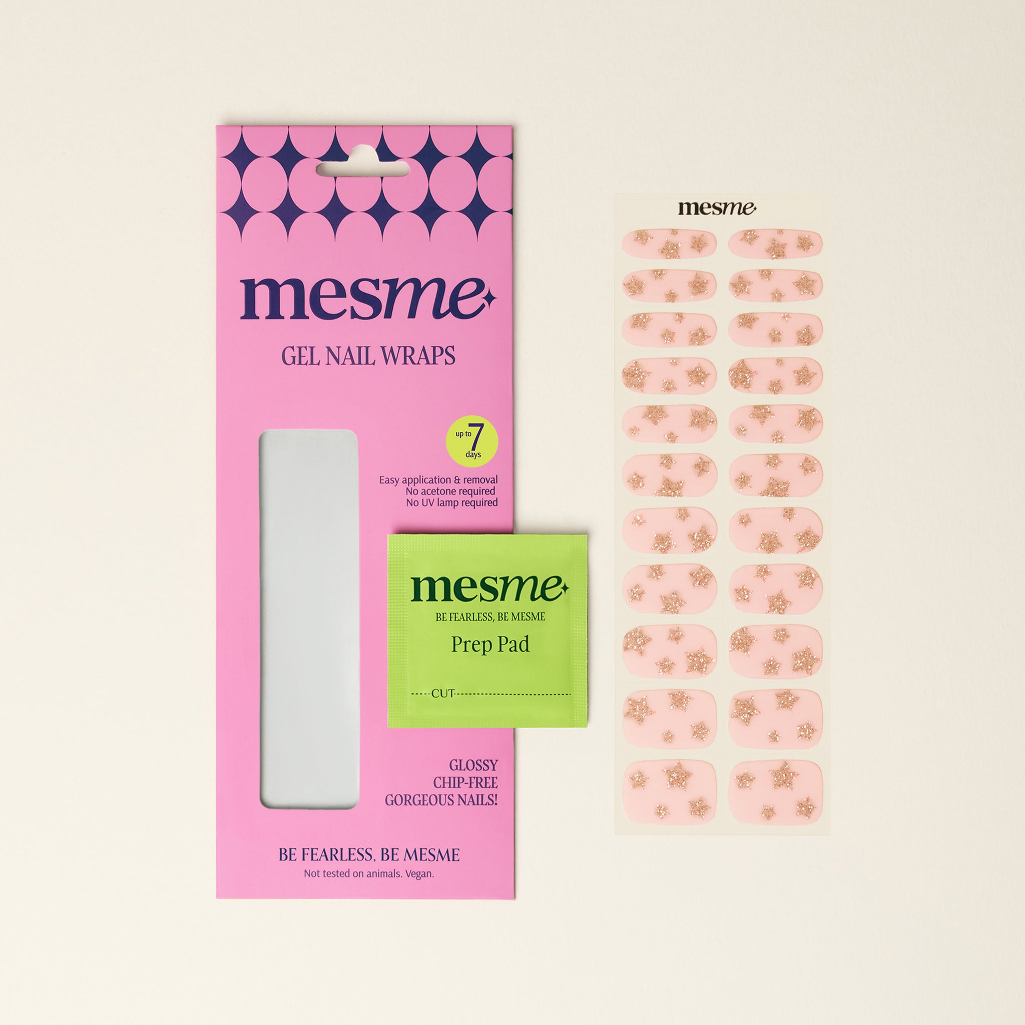 Mesme STAY gel nail wraps packaging with a pink design and gold glitter stars on a beige background