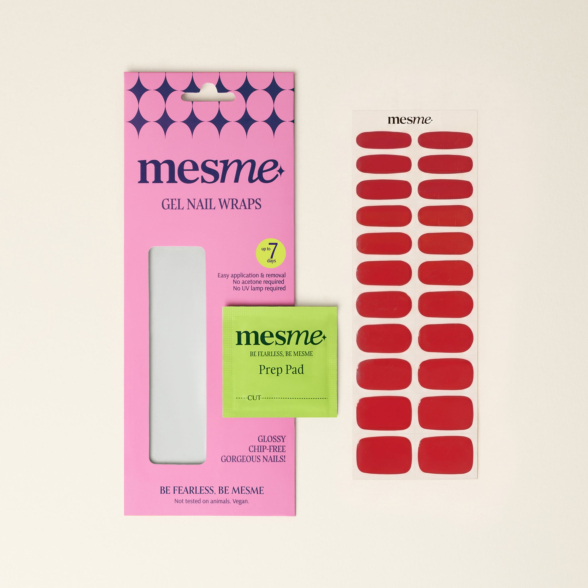 Mesme gel nail wraps packaging with red nail wraps and green prep pad on a neutral background