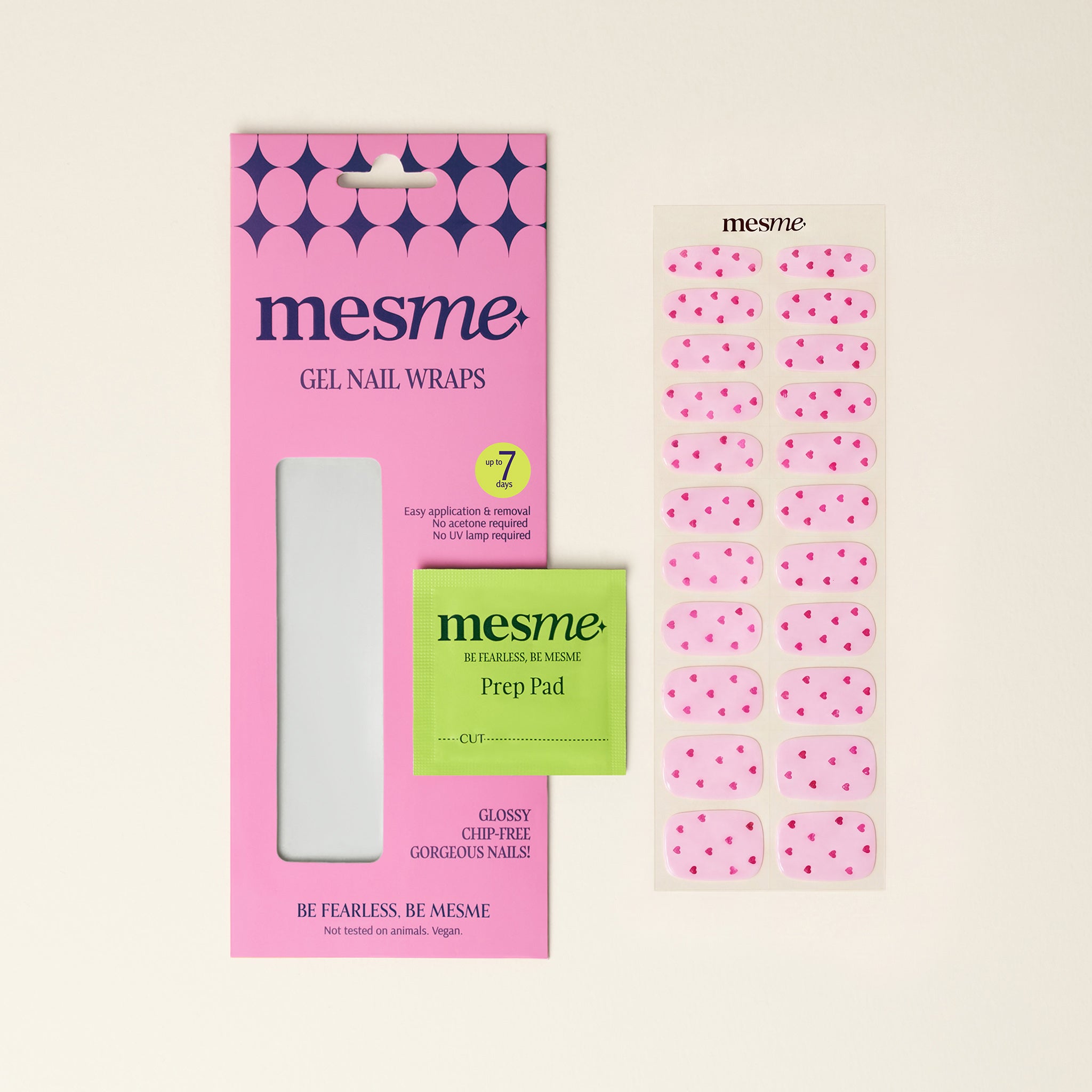 Rita mesme pink heart gel nail wraps with packaging and prep pad on a neutral background.