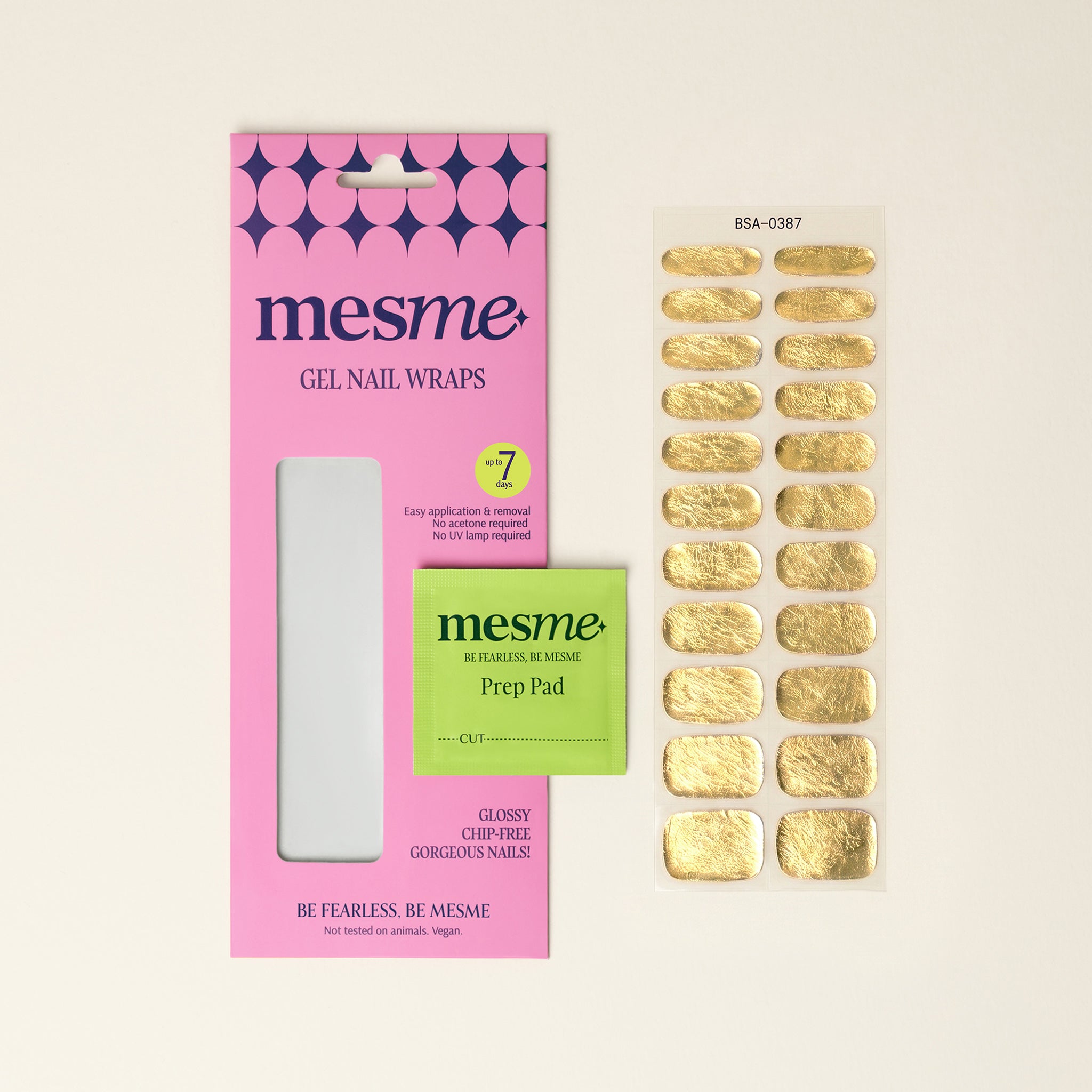 Mesme gel nail wraps packaging with gold wraps on a neurtal background