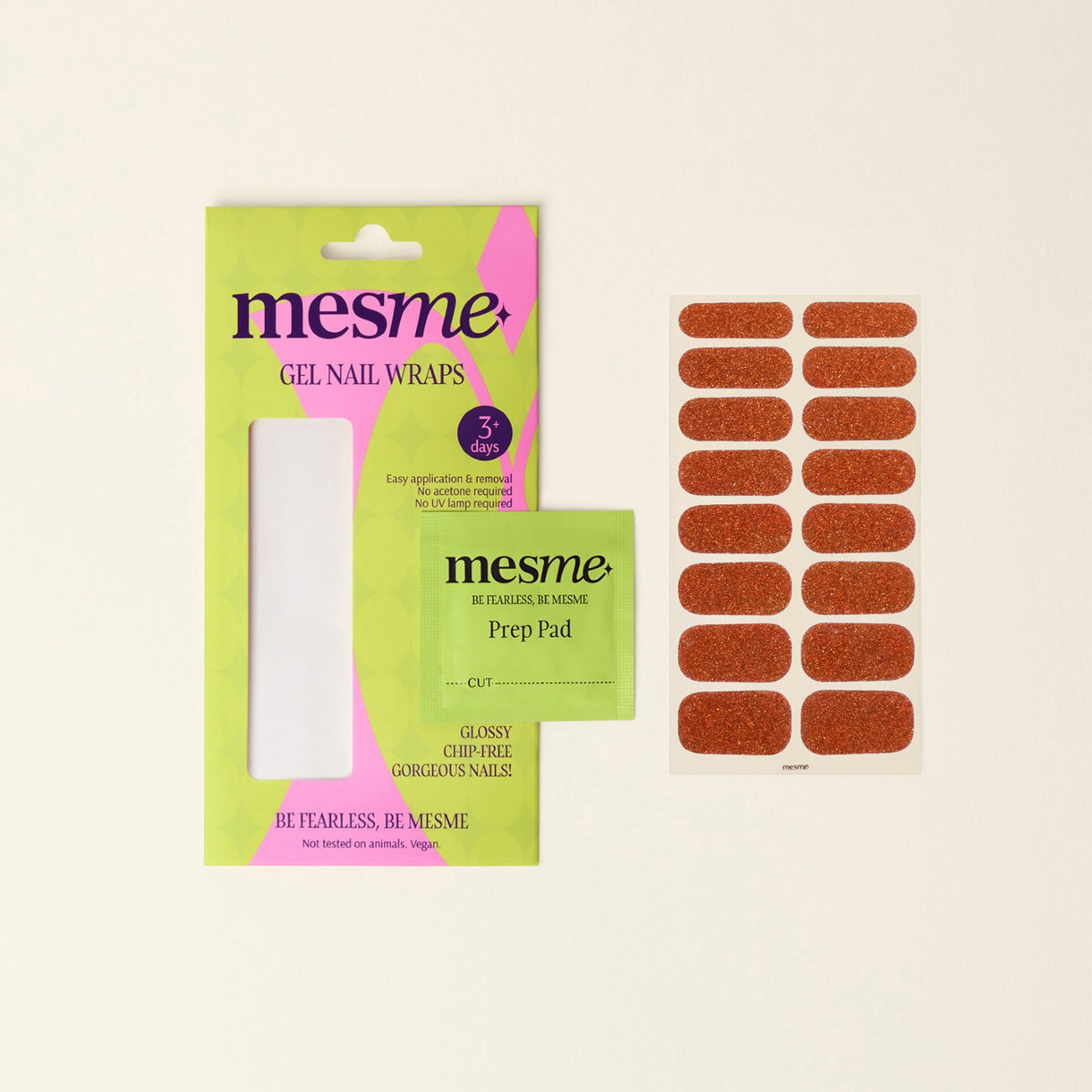 Mesme Gel Nail Wraps kit on a cream background, showing the retail packaging, a green prep pad card, and a sheet of orange-brown glitter nail wraps.