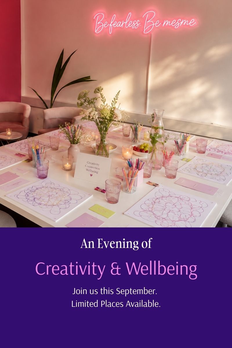 Promotional banner for an evening of creativity and wellbeing, showing a decorated table with art sheets, pens, and candles, with a purple text overlay at the bottom reading 'An Evening of Creativity & Wellbeing'.