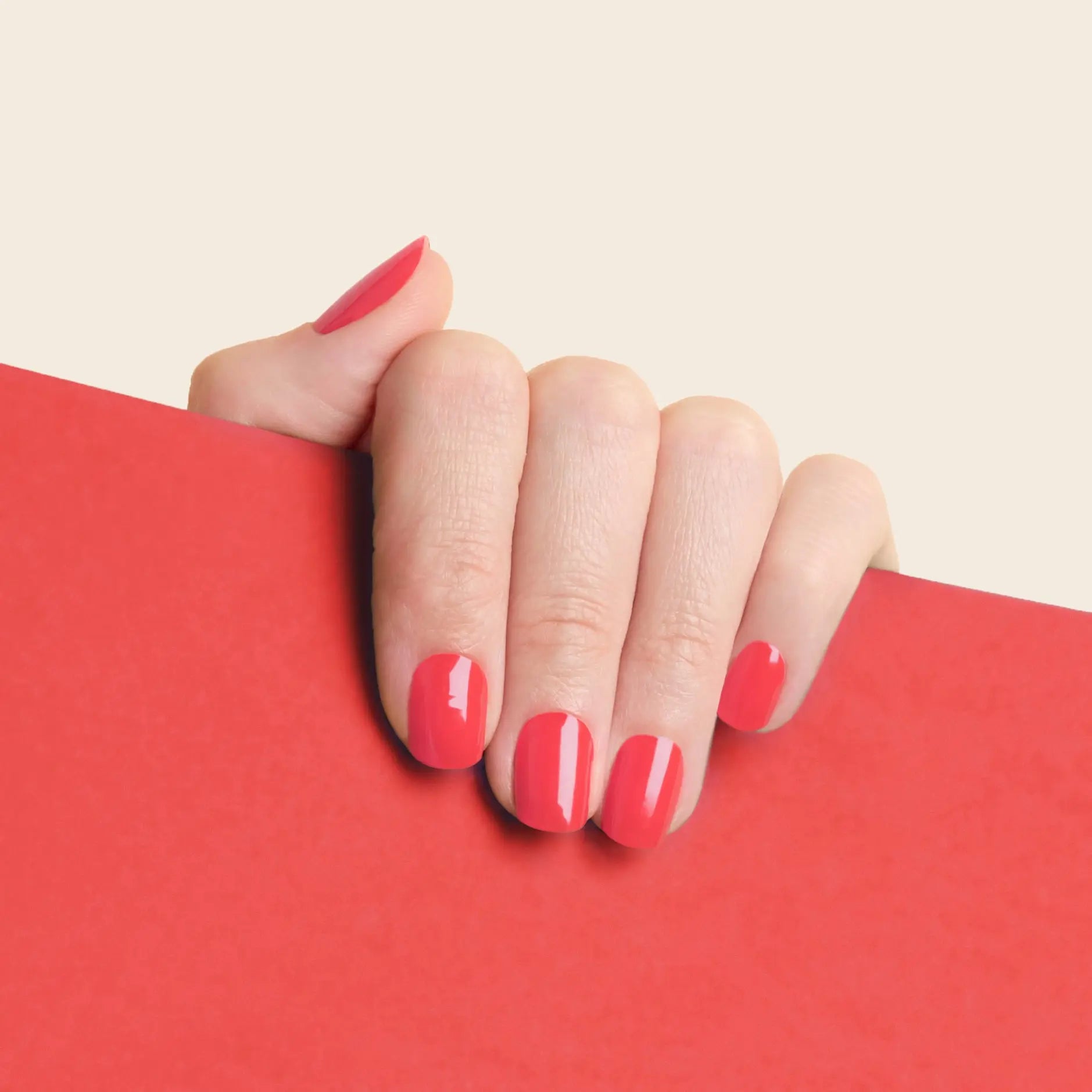 mesme Emi Bright Pink-Red 14-Day UV Gel Nail Wraps On Hand