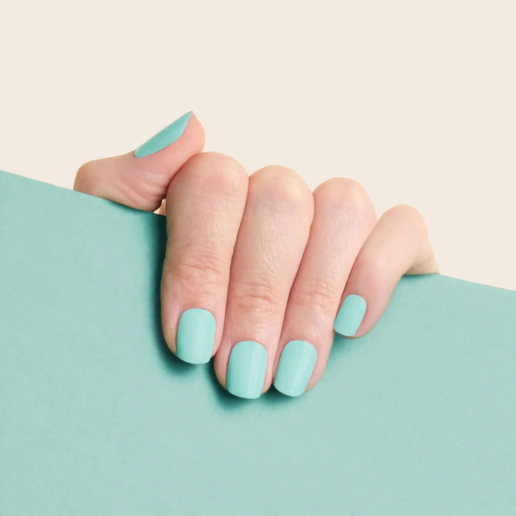 mesme Jelena Pastel Aqua 3+ Day UV-Free Gel Nail Wraps On Hand