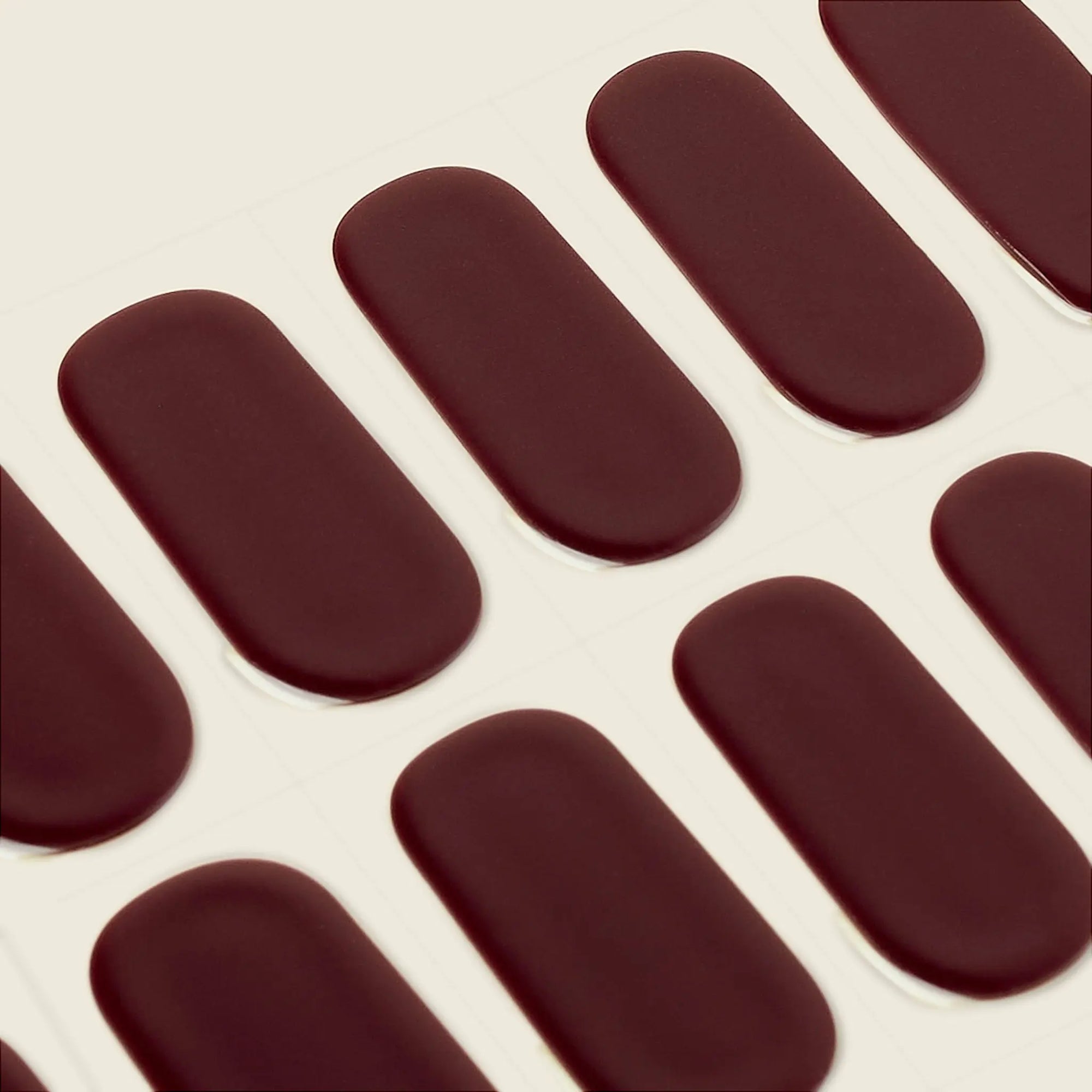 mesme Pili Burgundy Red 14-Day UV Gel Nail Wraps — Strip Sheet Close-Up