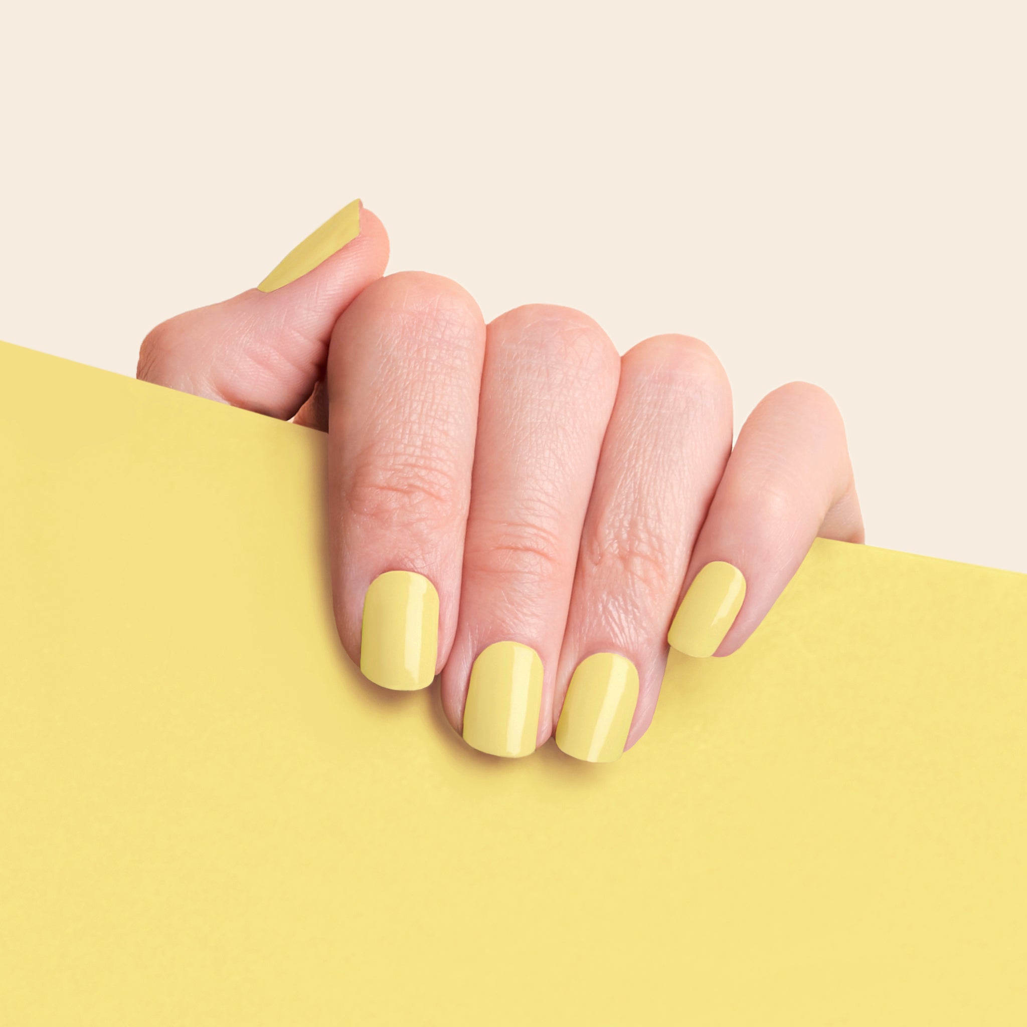 mesme Ramune Pastel Yellow 10-Day UV-Free Nail Wraps On Hand