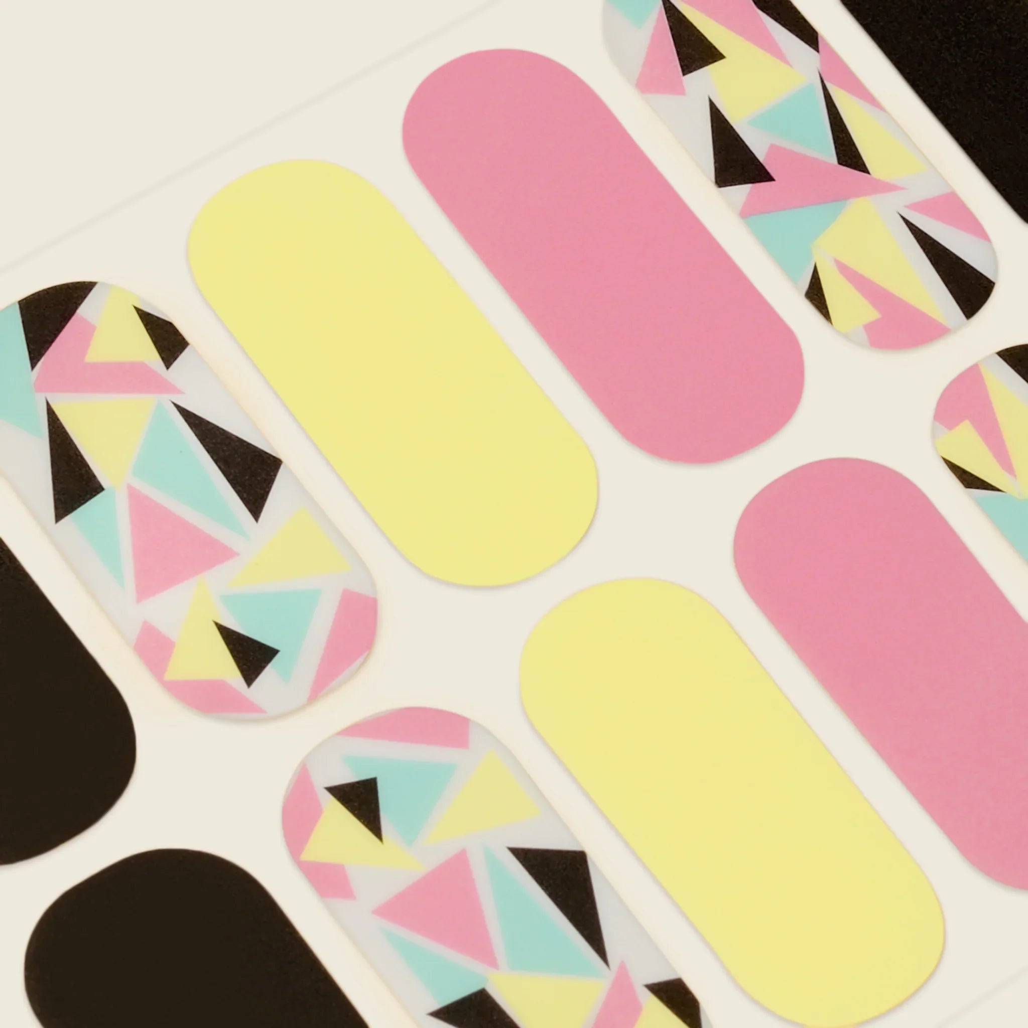 mesme Risa Black, Pastel Yellow, Sky Blue 3+ Day UV-Free Gel Nail Wraps — Strip Sheet Close-Up