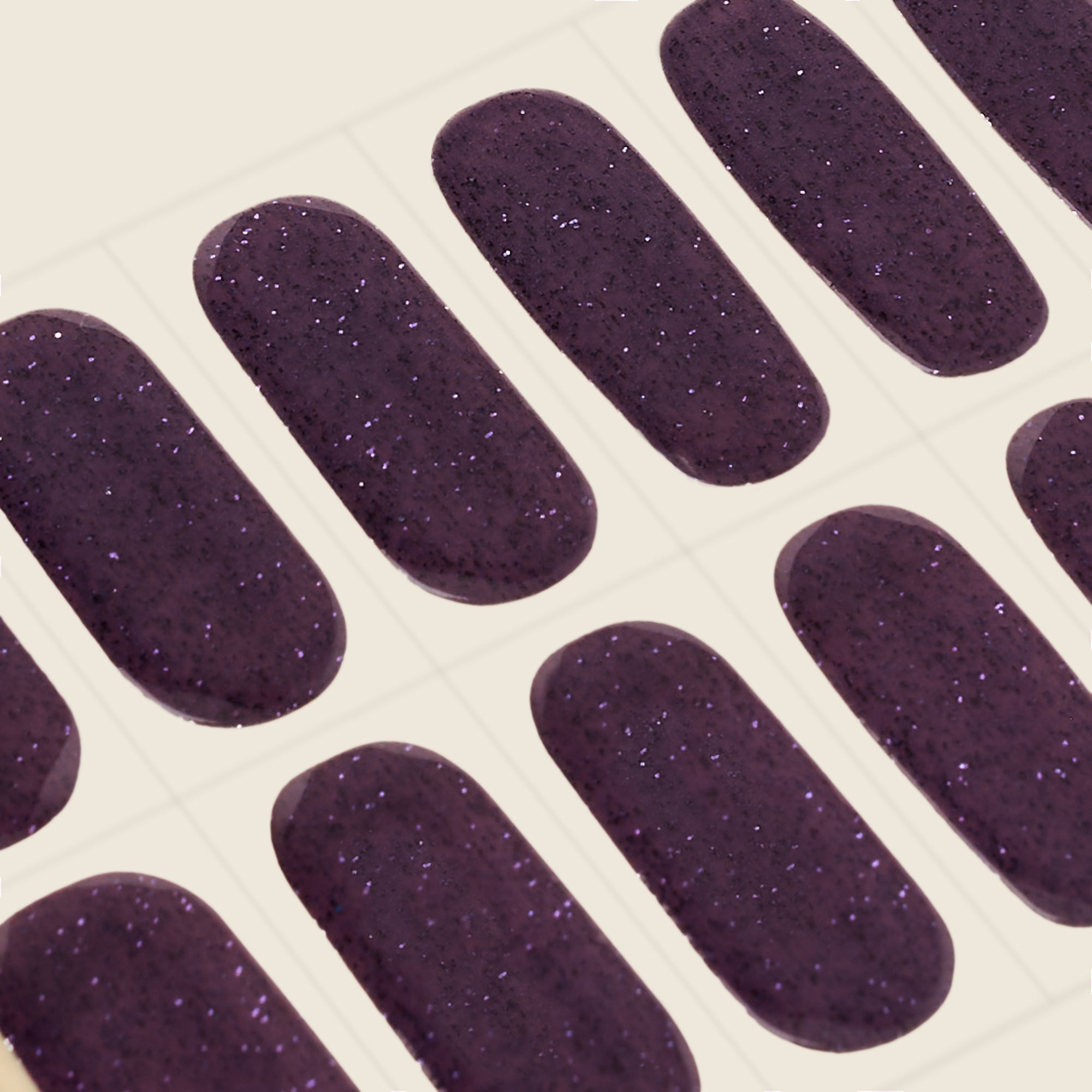 mesme Stephanie Dark Plum Glitter STAY UV-Free Nail Wraps — Strip Sheet Close-Up